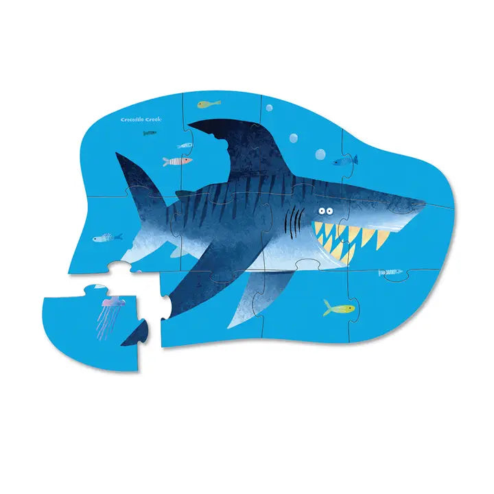 12-piece mini puzzle for kids featuring a fun shark-themed city scene