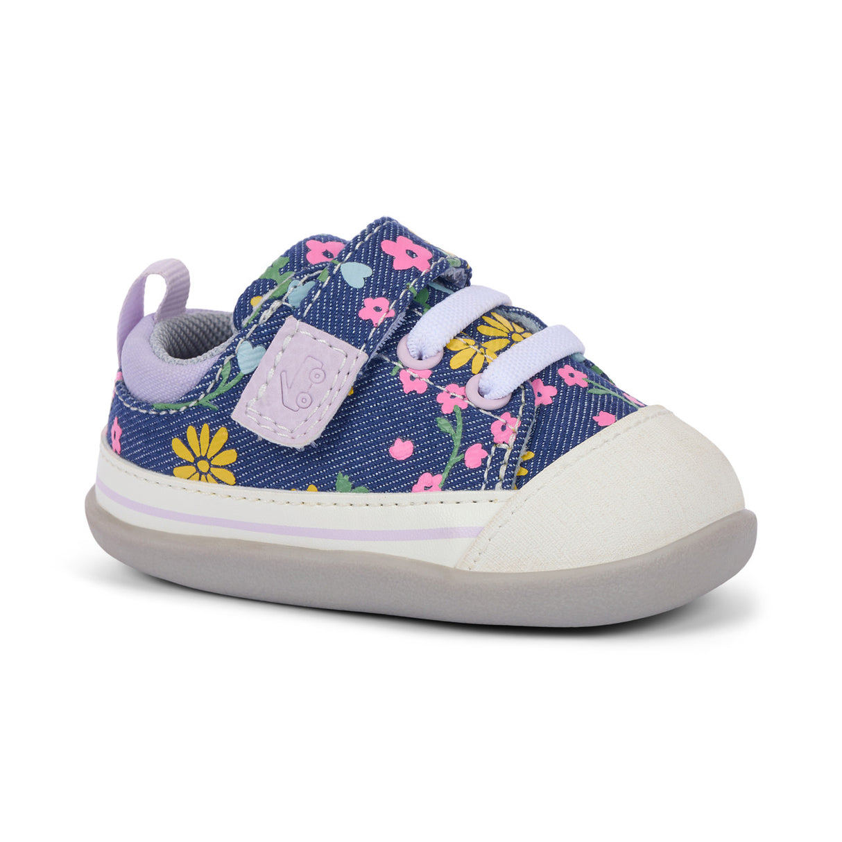 Children's blue denim sneakers with embroidered floral patterns, adjustable hook-and-loop straps, and textured rubber soles for secure grip during play. Lightweight design supports active movement.