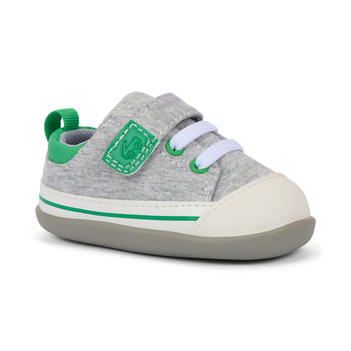 Children's gray sneakers with reinforced rubber toe caps, adjustable hook-and-loop straps, and air-mesh uppers. Flexible soles support active play while preventing slips.