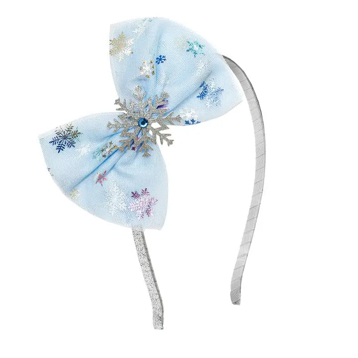 Kids’ headband with iridescent tulle bow inspired by a snow princess