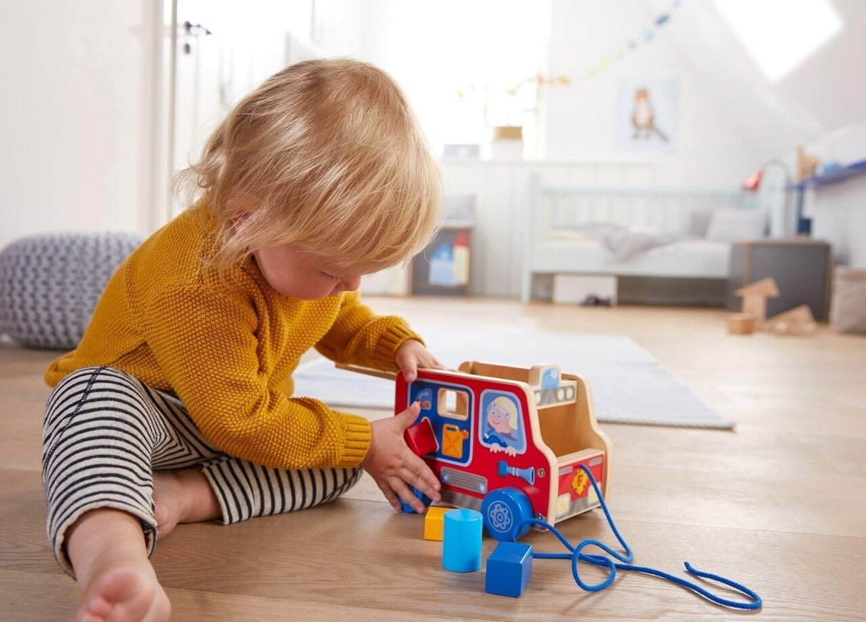 Haba Pulling Figure Fire Engine - Tadpole