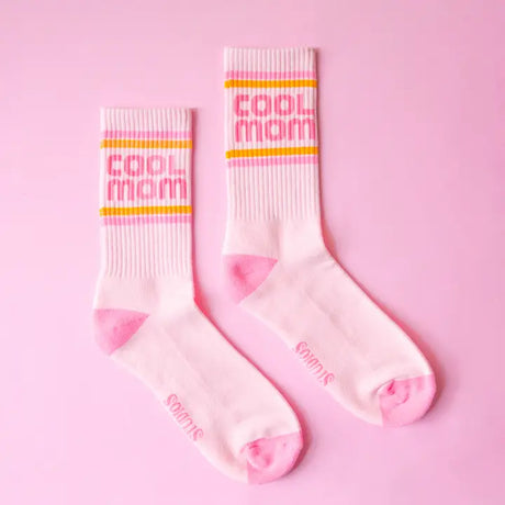 Mid-calf crew socks with subtle ribbed texture and tonal stripe accents, designed for mom’s effortless style with ankle boots or athleisure outfits.