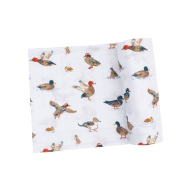 Baby swaddle blanket featuring cute duck prints, soft and cozy for newborn wrapping