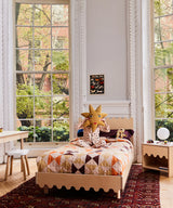 Moss twin bed designed with a minimalist style, perfect for kids’ rooms