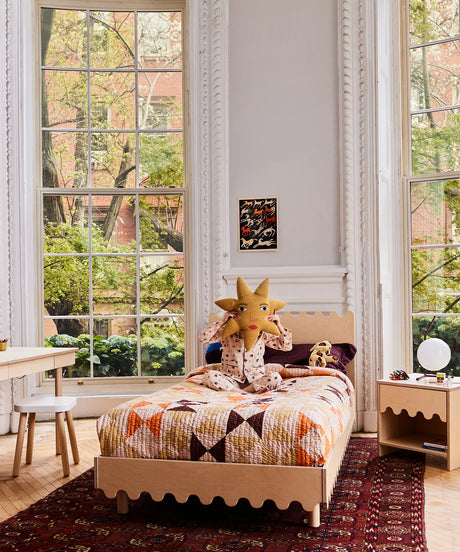 Moss twin bed designed with a minimalist style, perfect for kids’ rooms