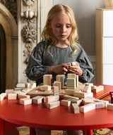 Moss Table with natural wood finish, sturdy and stylish kids’ activity table