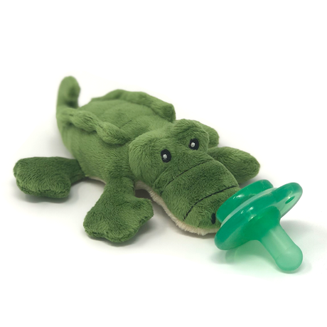 Alli Alligator plush toy with silicone pacifier and Hug Ring for baby self-soothing. Machine-washable, compatible with major pacifier brands.