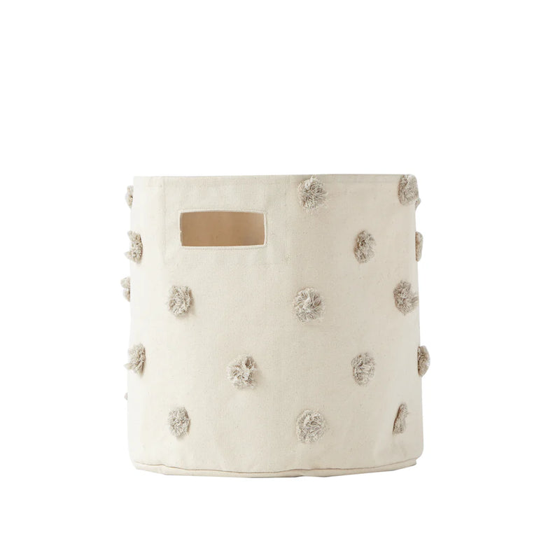 Pehr pom pom decorated storage basket, stylish and practical for nursery organization


